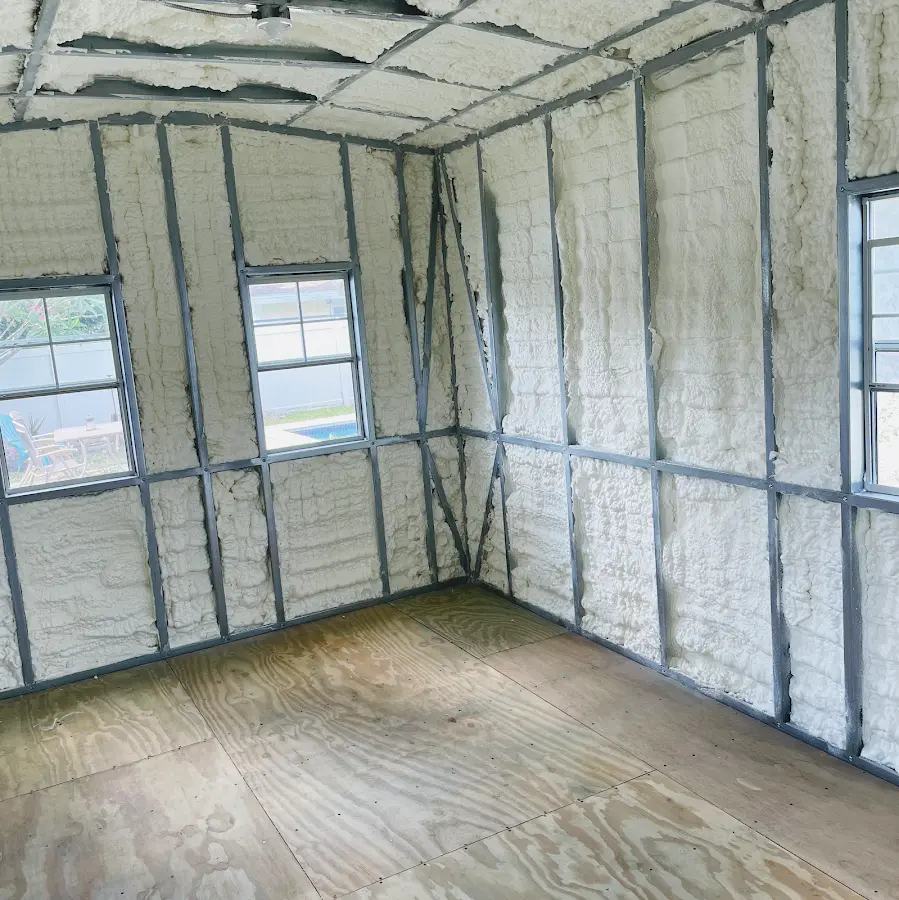 Closed-cell spray foam insulation applied to wall cavities in a residential project in Highlands